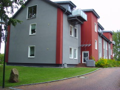 Klicken für Vollbild: WDVS an einem Stadthaus in Plön Bild: WDVS an einem Stadthaus in Plön